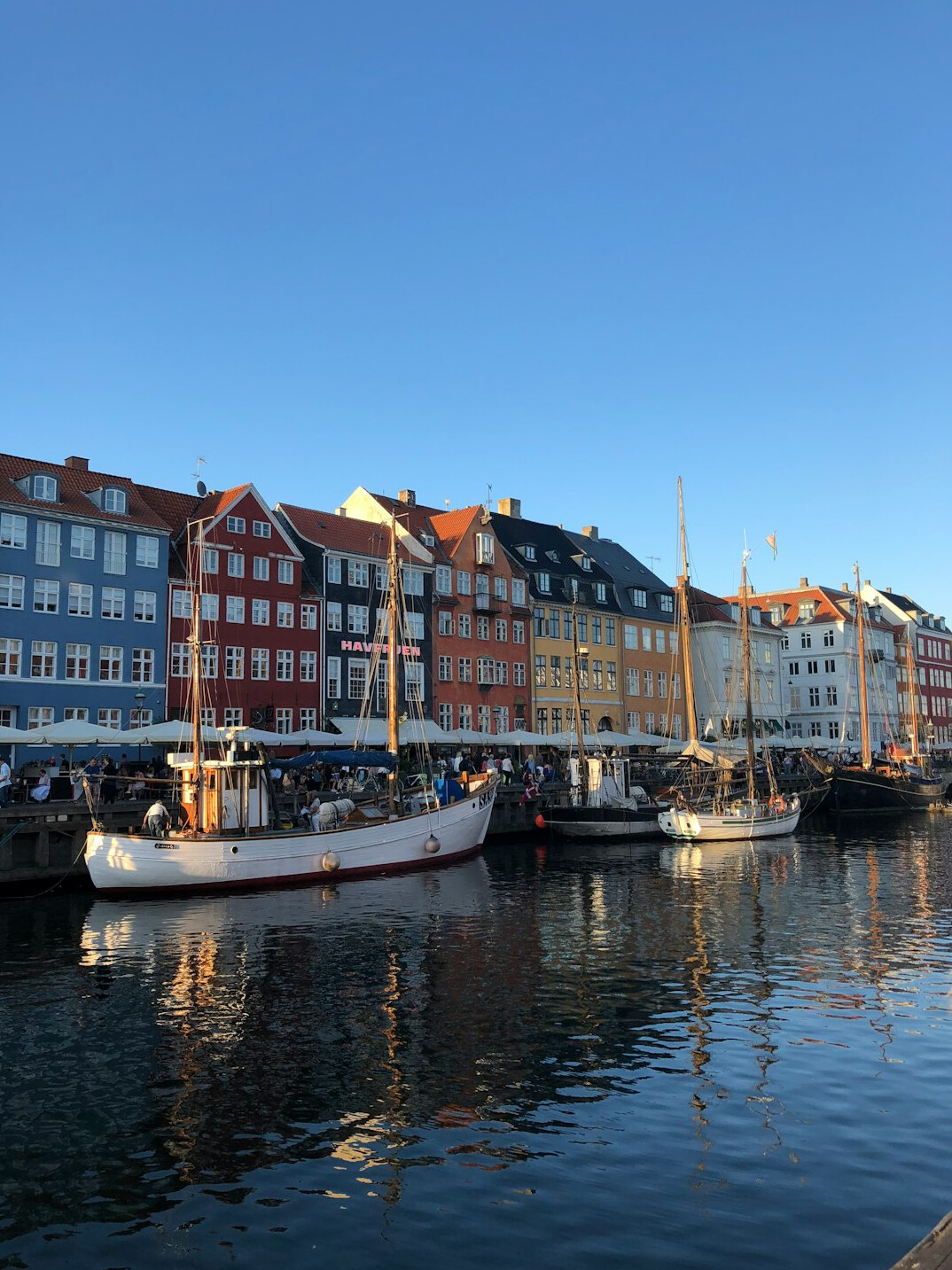 Colourful harbour houses in Copenhagen on a calm morning