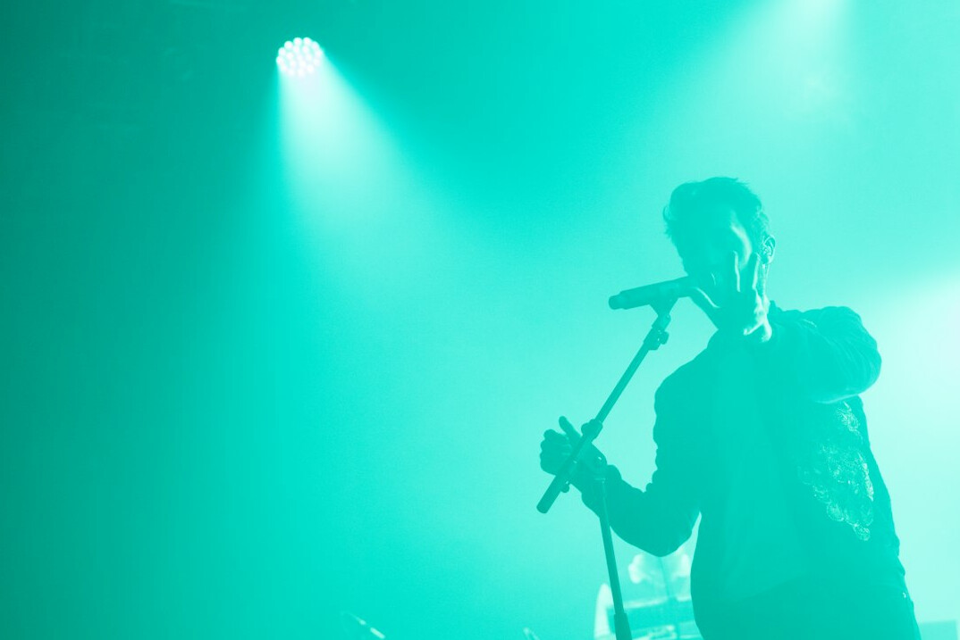 pop star on stage performing