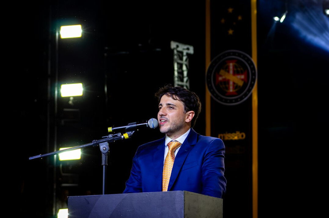 minister speaking at podium
